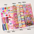 Kids hair accessory set with colorful clips, floral pins, and elastic bands in a tray - B80 (840PCS Boxed Set)
