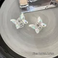 Set of two mini 2.5cm iridescent butterfly hair claws with holographic aurora finish - Butterfly