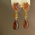Macro view of vintage resin drop earrings with amber bead and golden floral settings - 44# Silver Needle-Gold-Coffee-Teardrop