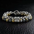 Detail of men's layered bracelet with silver link chain and textured malachite-style beads - 21cm / Yellow