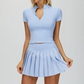Light blue two-piece yoga set with quarter-zip short sleeve top and pleated tennis skirt - S / Top And Bottom / Blue