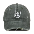 Distressed charcoal baseball cap featuring a white skull gesture embroidery and ripped details - Green