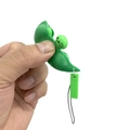 Detailed view of green silicone pea pod toy being squeezed with cartoon faces - Squeeze Pea Pod (OPP Bagged / With Rope Chain)