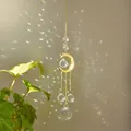 Golden crescent moon suncatcher with multifaceted crystal balls casting rainbows - 04 Face Moon / 95g