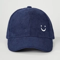 Detail of navy corduroy baseball cap with embroidered smiley face and ribbed texture - Embroidered Smile / Navy Blue