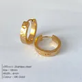 Orecchini a cerchio in acciaio inossidabile placcati oro 18K con finitura martellata - 18mm / Oro
