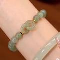 Elegant light green beaded bracelet featuring interlocking rings and golden accents - S074 - Interlocking Bracelet With Green Beads #sz577