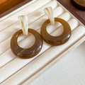 Macro detail of amber resin hoop earrings with marble texture in a jewelry box - 57# Silver Earring Post-White-Brown-Large Hoop Marble Pattern