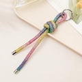 Rainbow gradient rhinestone knot keychain with silver ring on a professional beige tray - Knot Rhinestone Chain Pendant / Colorful
