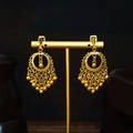 Detailed shot of golden bohemian tassel earrings displayed on a professional T-stand - Gold Braided Hollow Ball