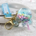 Lolly sleutelhanger met kleurrijke kralen en Sakura-band op witte pluche ondergrond - Blauw