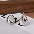 Elegant silver teardrop stud earrings for women with a minimalist metallic finish - Bright Silver (Platinum Plated)