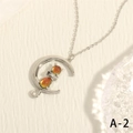 Close-up of 18K gold-plated moon and cat pendant necklace with iridescent cat eye stone - Silver Temperature Sensing Color Changing Cat Moon (NE2147-A-2)