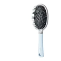Light blue curved fishbone vent hairbrush with green-tipped bristles and ergonomic handle - Cushion Brush / Sky Blue