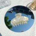 Close-up of iridescent pearlescent hair claw clip showing shell-like texture and shine - 10.5cm / Mermaid White