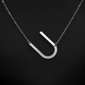 Elegant silver stainless steel necklace featuring a minimalist uppercase U letter pendant - White Letter U