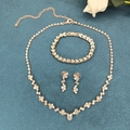 Flat lay of rose gold jewelry set with crystal necklace, bracelet and earrings detail - Rose Gold Necklace Bracelet Earrings Set (425)