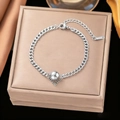 Detailed macro view of silver steel chain bracelet featuring a polished ball pendant - Steel Single Bead Bracelet (SLE201)