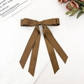 Detail of a dark brown double-layer silk bow hair clip with elegant long ribbons - Brown