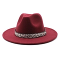Close-up of wine red wool fedora hat featuring a stylish snakeskin texture band and gold stud - Burgundy