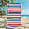 Microfiber beach towel with colorful horizontal stripes hanging on a tropical beach scene - 80*160cm