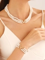 Ensemble élégant de colliers et bracelet en perles blanches avec pendentifs V dorés - Ensemble Perles Artificielles Forme V (5224+7472)