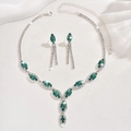 Detailed view of silver bridal set with emerald marquise rhinestones and drop tassel earrings - 650 Green