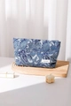 Detail of blue paisley jacquard cosmetic bag featuring woven H&R BAG brand label - Blue Large