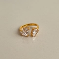 Macro detail of 18k gold plated open ring with square and teardrop zircon stones - Double Clear Zircon / White