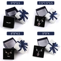 White jewelry gift box with dark blue ribbon bow in four different square sizes - White / Blue Ribbon