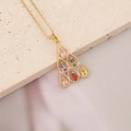 Detailed view of a gold Christmas tree pendant with vibrant colorful zircon stones - Christmas Tree Design (8#)