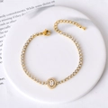 Elegant gold-tone tennis bracelet featuring a halo oval zircon and lobster clasp - White Zircon Oval