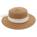 Close-up of a woven raffia boater hat featuring an elegant cream chiffon ribbon bow - One Size / Khaki