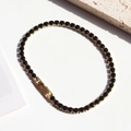 Tennis bracelet with black round stones and gold-plated chain featuring a secure clasp - Gold-Black Zircon