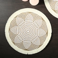 Round jute placemat with white geometric patterns and beige tassels on wood - 38cm / Fringed Circular