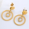 Close-up of golden circular earrings with Roman numerals and white shell center - Gold Roman Numeral Shell Double Ring (Style 8)