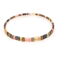 Bohemian Tila bead bracelet with pink, golden brown, and grey tiles on white backdrop - Pink Gold Grey Yellow Clear