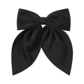 Close-up of a large black fabric bow hair clip with glossy texture and elegant drape - Black