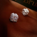 Macro detail of geometric cube zircon earrings on silk fabric background - Square Zircon Stud Earrings (HE15628) / Silver