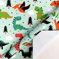 Green dinosaur wrapping paper featuring cartoon T-rex and trees for kids birthdays - Cartoon Dinosaur / 0.43*3m