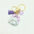 Purple glitter resin letter B keychain with lavender tassel and gold lobster clasp - Letter B