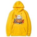 Bright yellow Halloween hoodie with cute ghost and pumpkin prints in a flat lay view - Yellow
