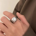 Irregular silver square ring with white pearlescent stone inlay on a model hand - Silver Forest Moon Pearl (JZ0197)