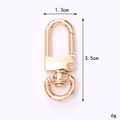 Detailed view of golden zinc alloy lobster clasp with dimensions 3.5cm by 1.3cm - 35mm D-Letter Door Buckle / Gold
