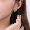 Golden heart earrings with blue gemstone inlays for women worn on earlobes - Blue