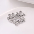 Distanziatori argentati a forma di ingranaggio per gioielli fai-da-te su vassoio bianco - 4mm / Oro Bianco