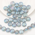 Détail de perles spirales en verre bleu aurora pour bijoux DIY et accessoires - Vert Transparent