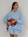 Detail of light blue linen-style set showing ruffled sleeves and textured fabric - S / Blue