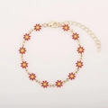 Elegante bracciale in metallo dorato con dodici margherite rosse e chiusura a moschettone - Margherita Rossa