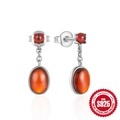 Elegant 925 sterling silver earrings with oval amber red gemstones on white background - White Gold